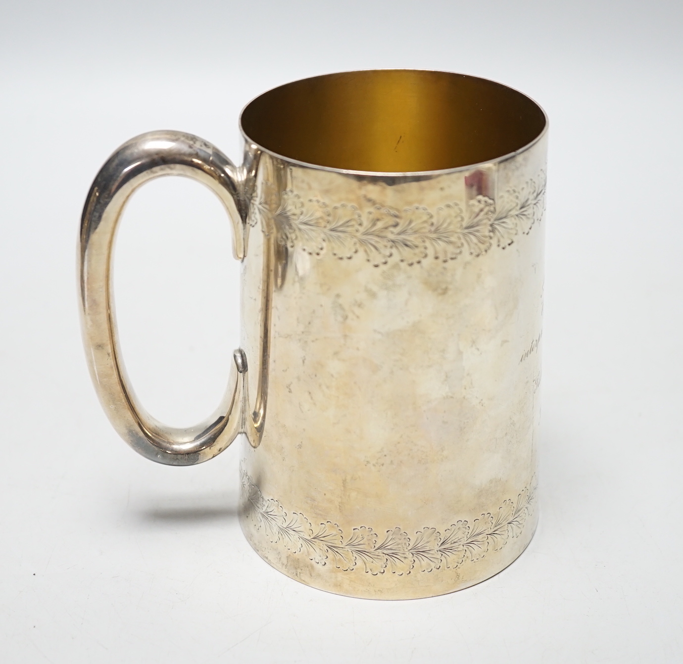 A Victorian engraved silver tankard, William & John Barnard, London, 1882, 12cm, 10.8oz.